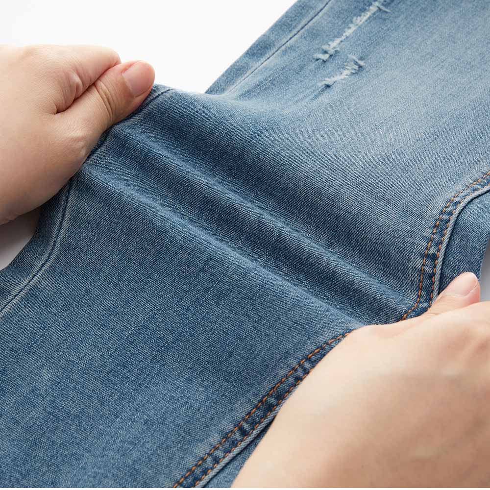 不對稱割破窄管牛仔孕婦褲